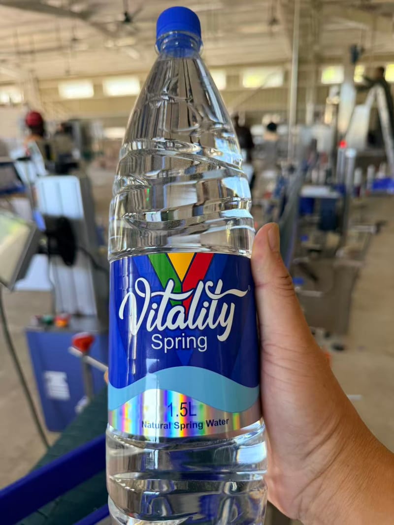 A 1.5L bottle of Vitality Spring on the bottling line at the Rentapao factory